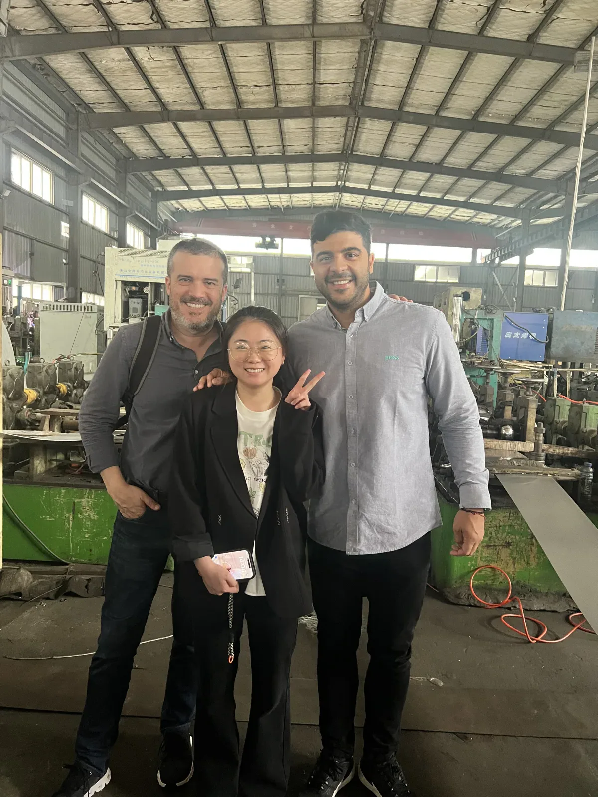 HexMetal team with manufacturer staff during a plant visit